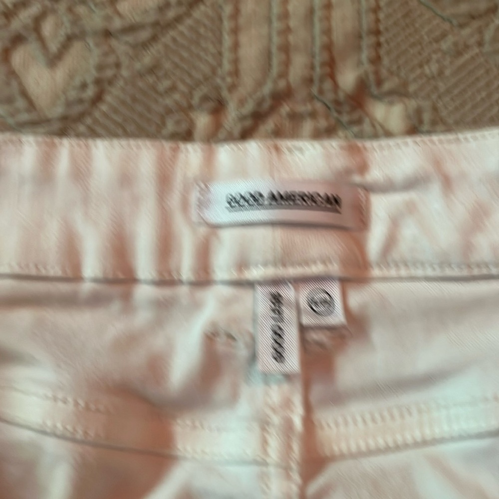 White good American jeans distressed pockets and hem